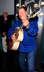 William Shatner clowns around with a special painted guitar presented to him by Gibson and Mandy Lawson