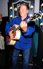 William Shatner clowns around with a special painted guitar presented to him by Gibson and Mandy Lawson